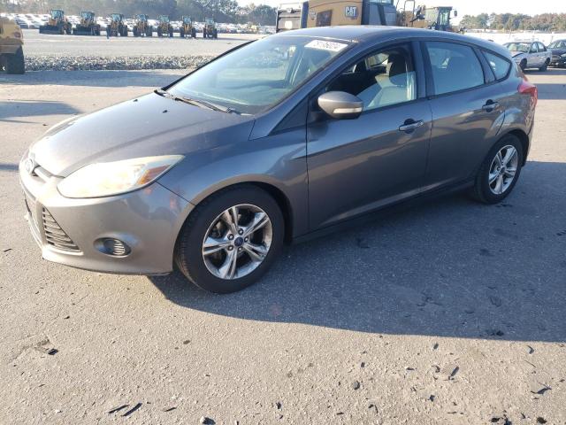 FORD FOCUS SE 2014 with VIN 1FADP3K23EL324990 - Photo from auction