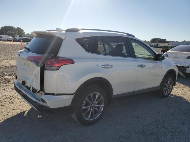 Photo 3 from auction – 2018 TOYOTA RAV4 LIMIT with VIN JTMYFREV8JJ211775