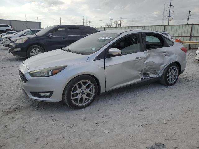 FORD FOCUS SE 2015 with VIN 1FADP3F29FL320079 - Photo from auction
