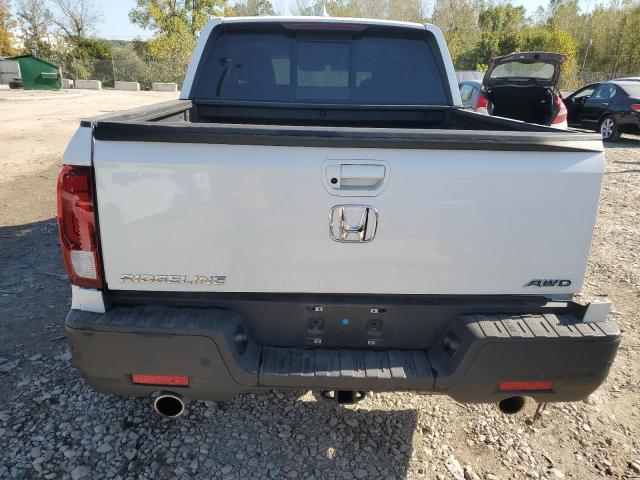 Photo 6 from auction – 2022 HONDA RIDGELINE with VIN 5FPYK3F7XNB027483