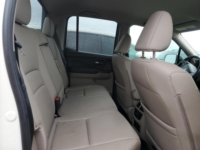 Photo 11 from auction – 2018 HONDA RIDGELINE with VIN 5FPYK3F65JB005408