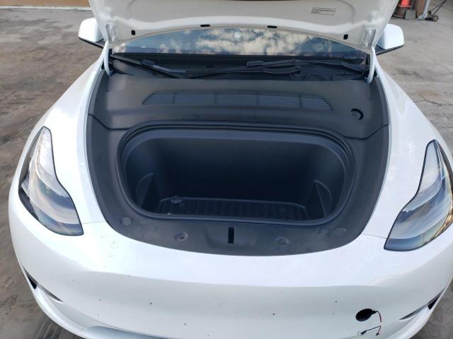Photo 11 from auction – 2023 TESLA MODEL Y with VIN 7SAYGDEF9PF624087