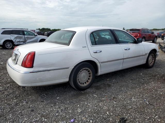 Photo 3 from auction – 2002 LINCOLN TOWN CAR E with VIN 1LNHM81W82Y609104