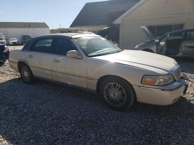 Photo 4 from auction – 2003 LINCOLN TOWN CAR E with VIN 1LNHM81W53Y704656
