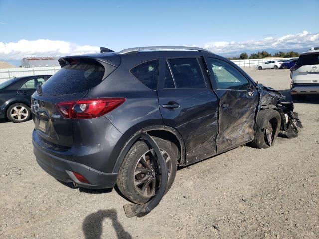 Photo 3 from auction – 2016 MAZDA CX-5 GT with VIN JM3KE4DY3G0838235