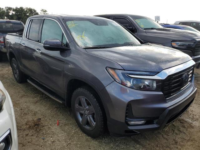Photo 4 from auction – 2022 HONDA RIDGELINE with VIN 5FPYK3F78NB010164
