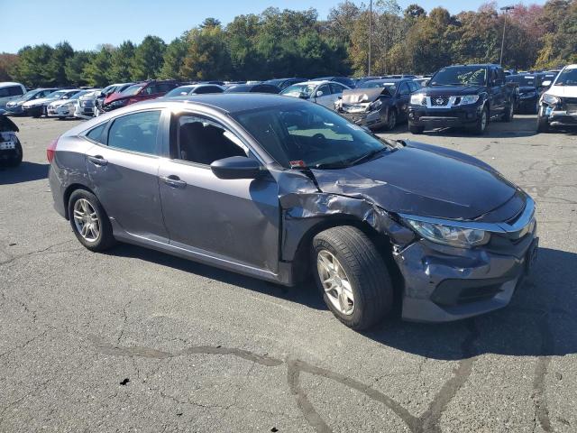 Photo 4 from auction – 2016 HONDA CIVIC LX with VIN 19XFC2F54GE235454