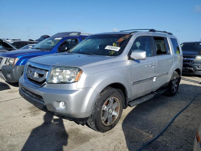 HONDA PILOT TOUR 2011 with VIN 5FNYF3H90BB047846 - Photo from auction