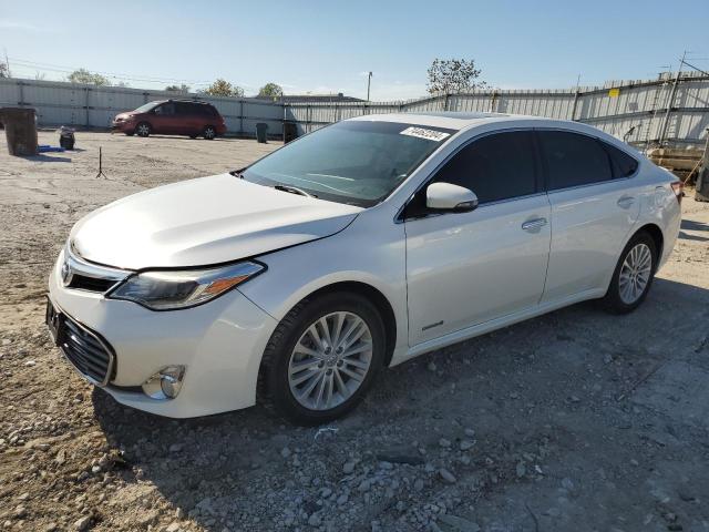TOYOTA AVALON HYB 2014 with VIN 4T1BD1EB7EU033229 - Photo from auction