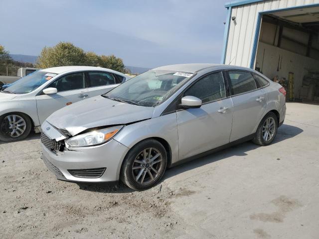 FORD FOCUS SE 2018 with VIN 1FADP3F26JL272257 - Photo from auction