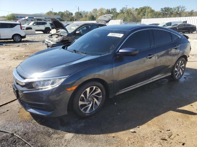 HONDA CIVIC EX 2017 with VIN 19XFC2F7XHE034340 - Photo from auction