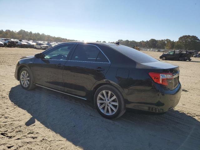 Photo 2 from auction – 2012 TOYOTA CAMRY HYBR with VIN 4T1BD1FK0CU032175