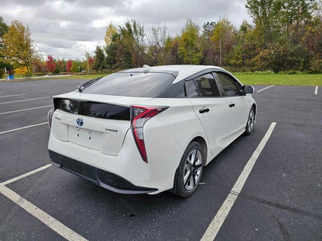 Photo 4 from auction – 2016 TOYOTA PRIUS with VIN JTDKARFU8G3022096