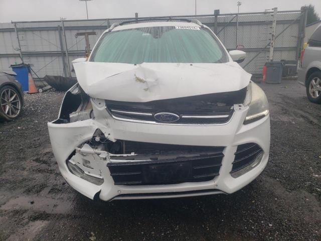 Photo 5 from auction – 2014 FORD ESCAPE TIT with VIN 1FMCU9J97EUE07702