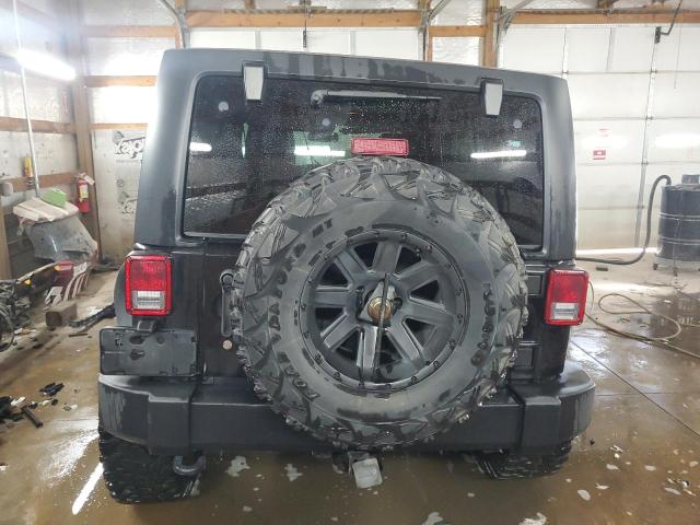 Photo 6 from auction – 2014 JEEP WRANGLER U with VIN 1C4BJWDG9EL250147