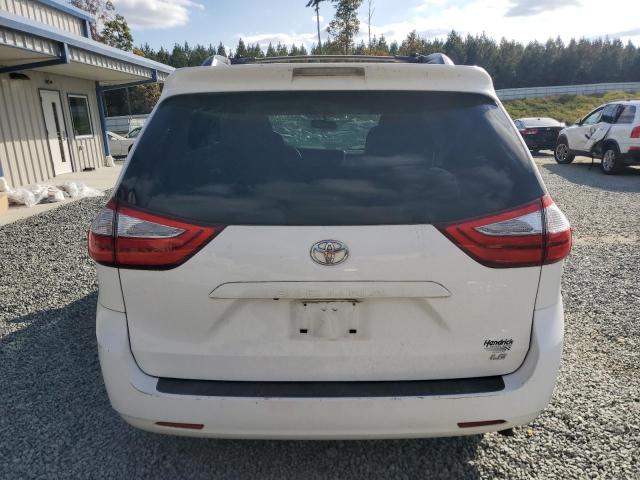 Photo 6 from auction – 2015 TOYOTA SIENNA LE with VIN 5TDKK3DC6FS676984