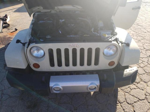 Photo 12 from auction – 2011 JEEP WRANGLER U with VIN 1J4BA5H15BL594001