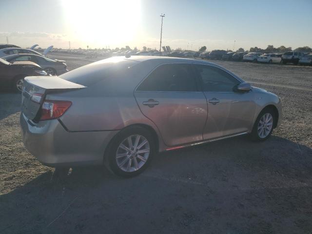 Photo 3 from auction – 2014 TOYOTA CAMRY HYBR with VIN 4T1BD1FK7EU108946