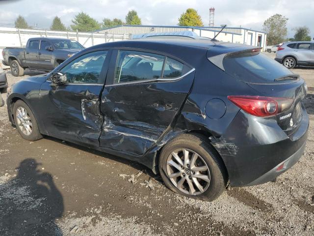 Photo 2 from auction – 2014 MAZDA 3 TOURING with VIN JM1BM1L74E1204894
