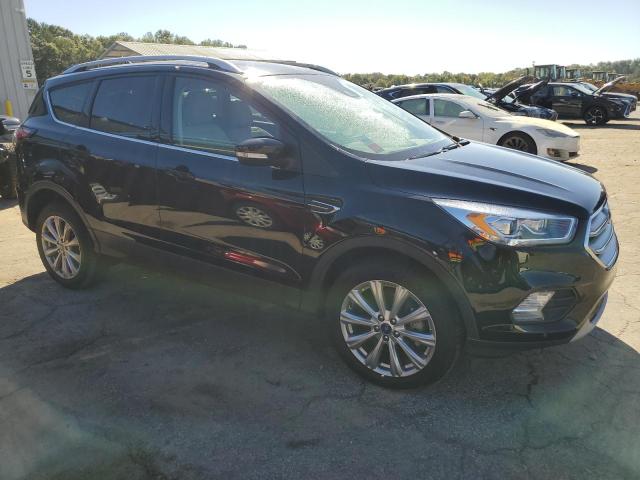 Photo 4 from auction – 2018 FORD ESCAPE TIT with VIN 1FMCU9J94JUD54791