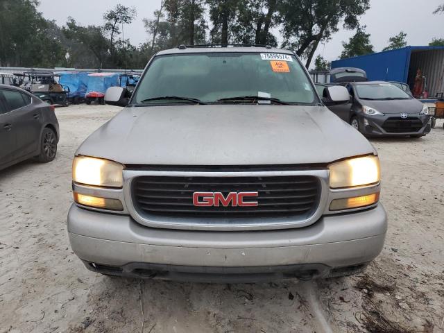 Photo 5 from auction – 2004 GMC YUKON with VIN 1GKEC13ZX4R251210