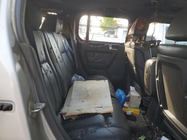 Photo 11 from auction – 2006 HUMMER H3 with VIN 5GTDN136268242400