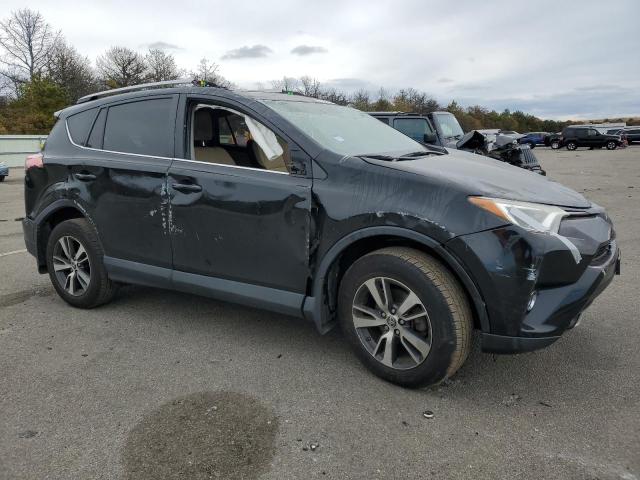 Photo 4 from auction – 2017 TOYOTA RAV4 XLE with VIN 2T3RFREV4HW661925
