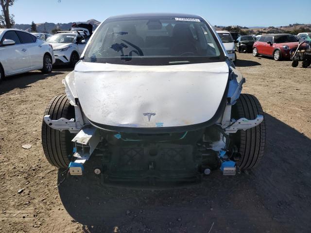 Photo 5 from auction – 2021 TESLA MODEL 3 with VIN 5YJ3E1EBXMF003137