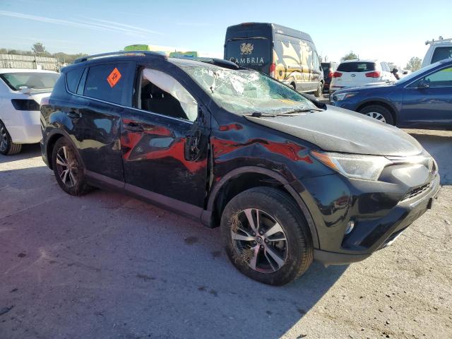 Photo 4 from auction – 2018 TOYOTA RAV4 XLE with VIN 2T3RFREV2JW794091