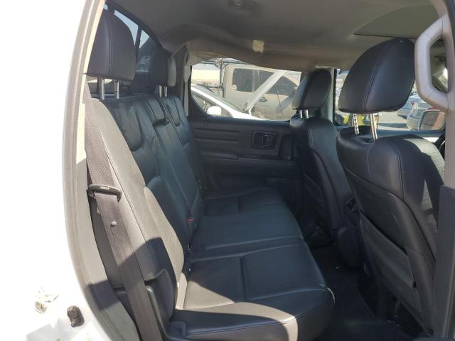 Photo 10 from auction – 2014 HONDA RIDGELINE with VIN 5FPYK1F6XEB007262
