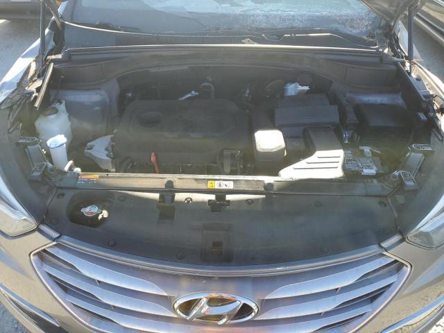 Photo 11 from auction – 2017 HYUNDAI SANTA FE S with VIN 5NMZU3LB0HH002871