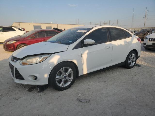 FORD FOCUS SE 2014 with VIN 1FADP3F24EL455713 - Photo from auction
