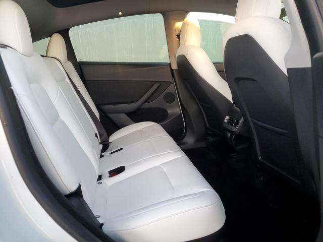 Photo 11 from auction – 2023 TESLA MODEL Y with VIN 7SAYGDEE1PF610286