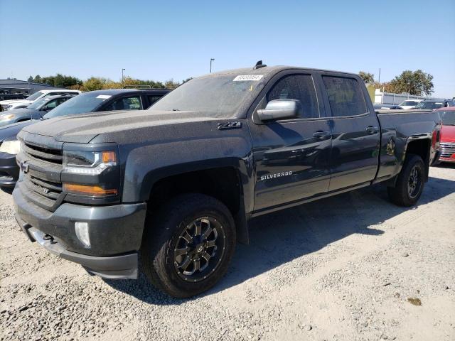 CHEVROLET SILVERADO 2017 with VIN 3GCUKREC0HG418813 - Photo from auction
