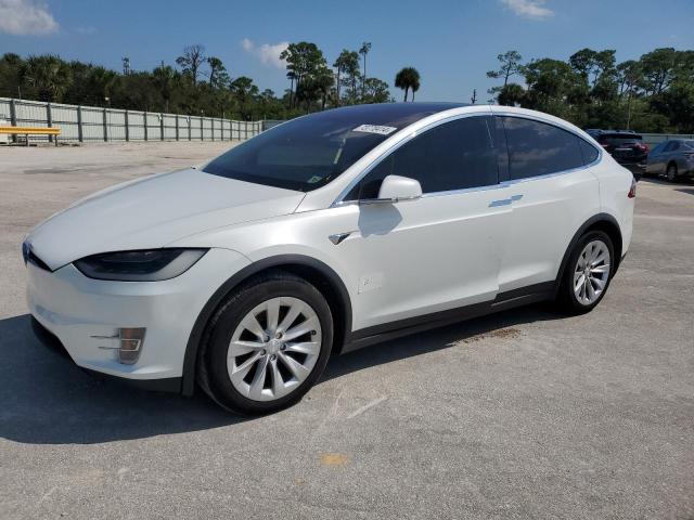 TESLA MODEL X 2018 with VIN 5YJXCDE22JF105262 - Photo from auction