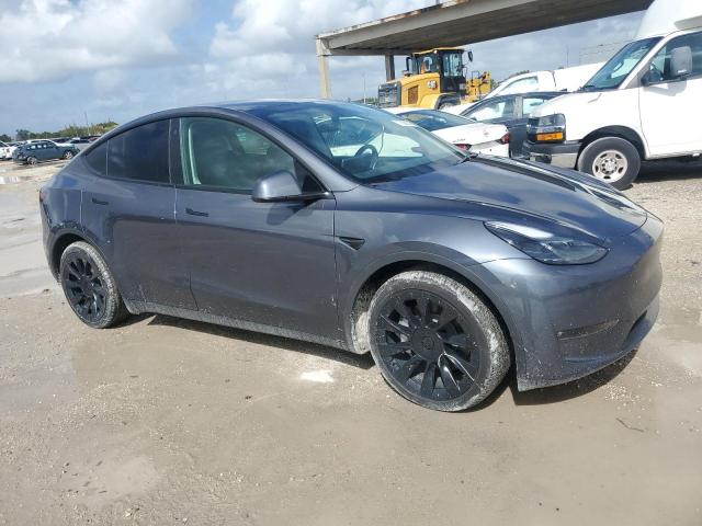 Photo 4 from auction – 2023 TESLA MODEL Y with VIN 7SAYGAEE6PF627048