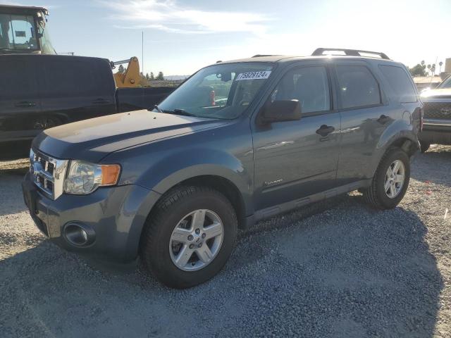 FORD ESCAPE HYB 2010 with VIN 1FMCU4K33AKB63498 - Photo from auction