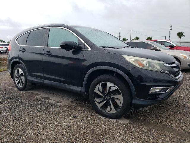 Photo 4 from auction – 2016 HONDA CR-V TOURI with VIN 5J6RM3H94GL007925