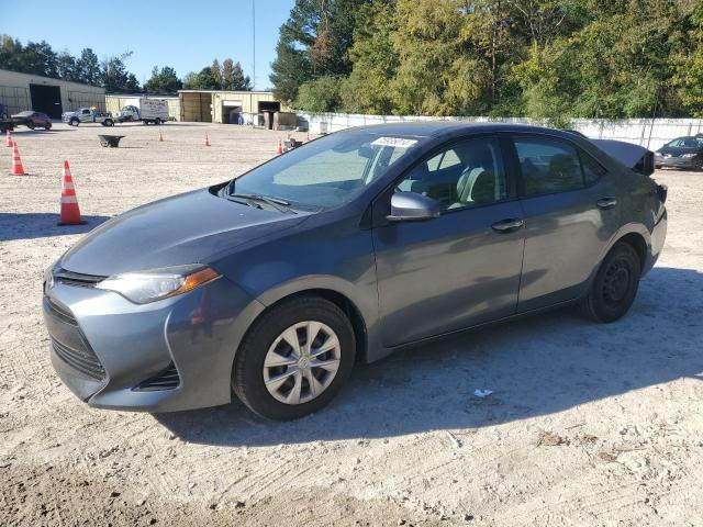 TOYOTA COROLLA L 2017 with VIN 2T1BURHE3HC832354 - Photo from auction