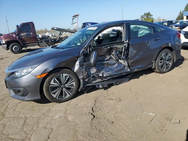 HONDA CIVIC EX 2016 with VIN 19XFC1F86GE016807 - Photo from auction