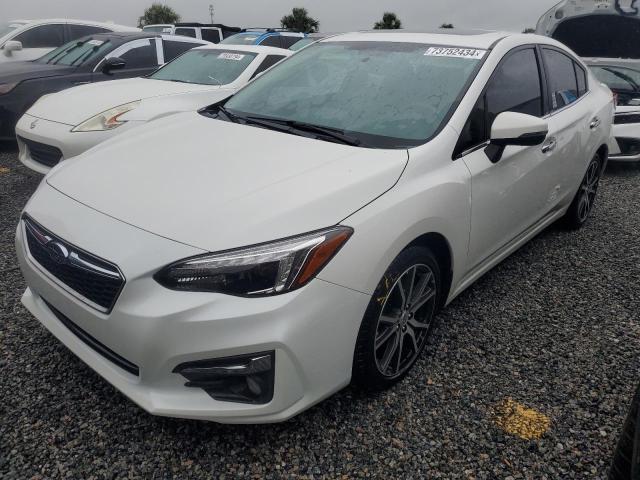 SUBARU IMPREZA LI 2018 with VIN 4S3GKAU63J3609032 - Photo from auction