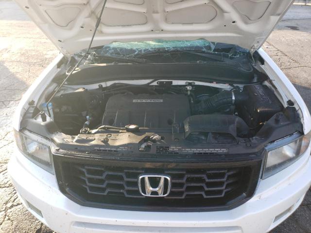 Photo 11 from auction – 2014 HONDA RIDGELINE with VIN 5FPYK1F68EB010404
