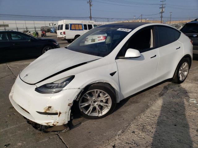 TESLA MODEL Y 2022 with VIN 7SAYGDEE0NF407211 - Photo from auction