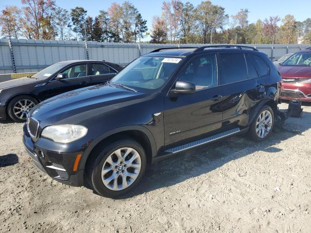 BMW X5 XDRIVE3 2012 with VIN 5UXZV4C5XCL990132 - Photo from auction