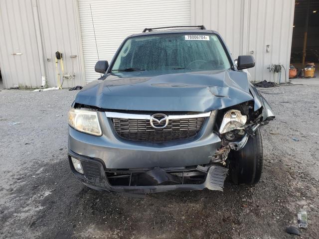 Photo 5 from auction – 2011 MAZDA TRIBUTE I with VIN 4F2CY0C79BKM02153