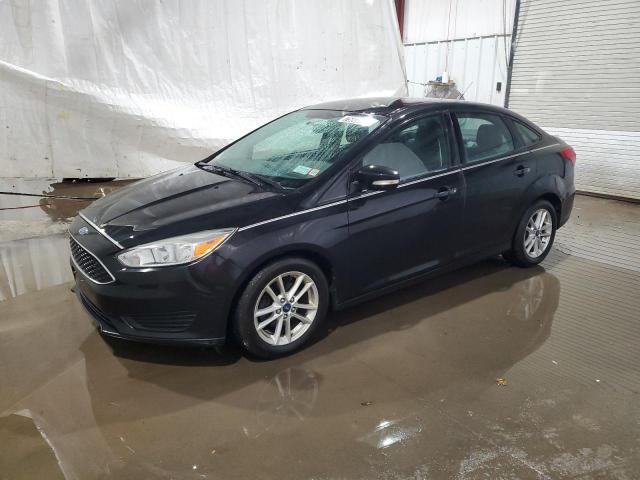 FORD FOCUS SE 2015 with VIN 1FADP3F21FL226892 - Photo from auction