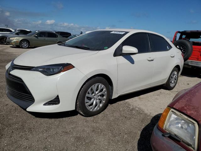 TOYOTA COROLLA L 2018 with VIN 5YFBURHE3JP813132 - Photo from auction