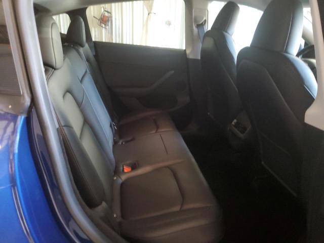 Photo 11 from auction – 2023 TESLA MODEL Y with VIN 7SAYGDEF2PF705917