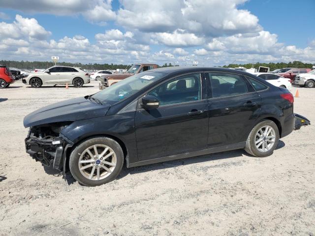 FORD FOCUS SE 2016 with VIN 1FADP3F27GL394988 - Photo from auction