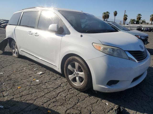 Photo 4 from auction – 2014 TOYOTA SIENNA LE with VIN 5TDKK3DC9ES481878